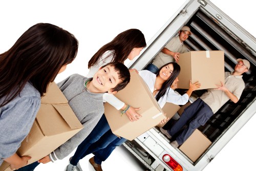 Packed boxes and furniture prepared for Elmstead removals
